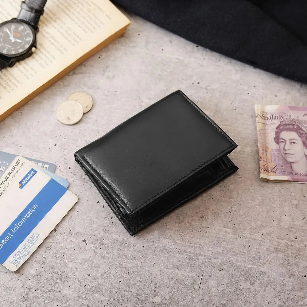 Flat lay of Basic Wallet Style 48 on a table, styled with everyday essentials.