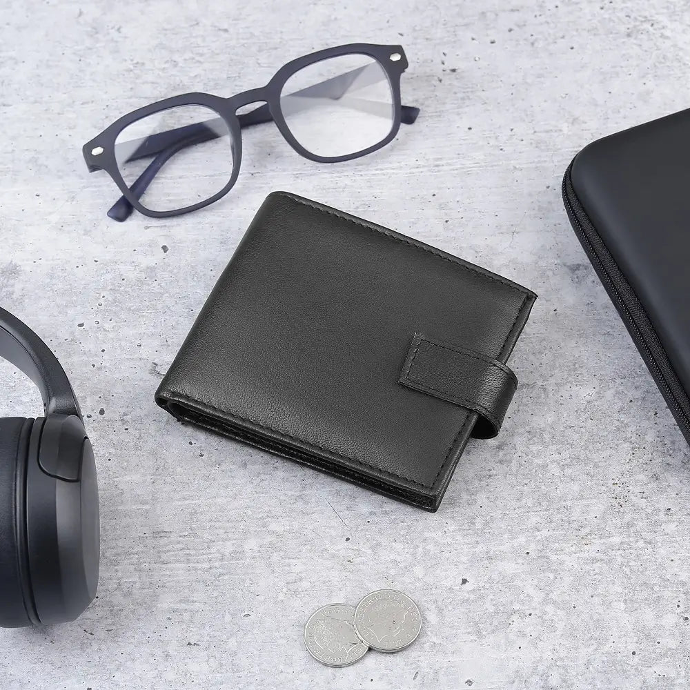 Flat lay of Basic Wallet Style 66 on a table, styled with everyday essentials.