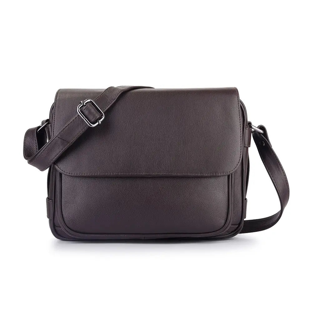 Brown leather multi-compartment crossbody bag front view with magnetic flap and front slip pocket.