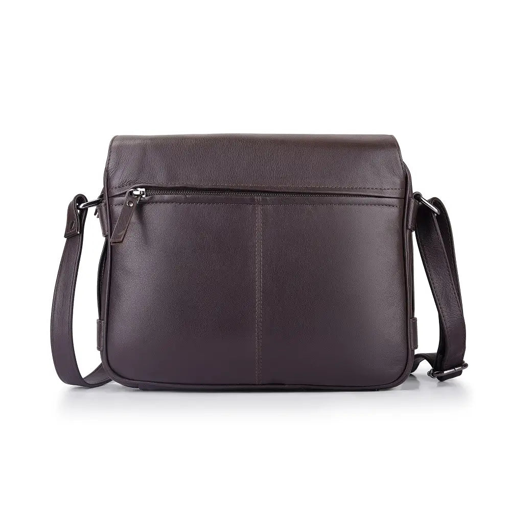Brown leather crossbody bag back view highlighting triple-compartment structure and zipped back pocket.