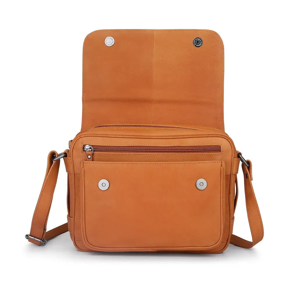 Tan leather crossbody bag open view showing triple-compartment interior with phone slip pocket, middle zipped compartment, and back zipped pocket.