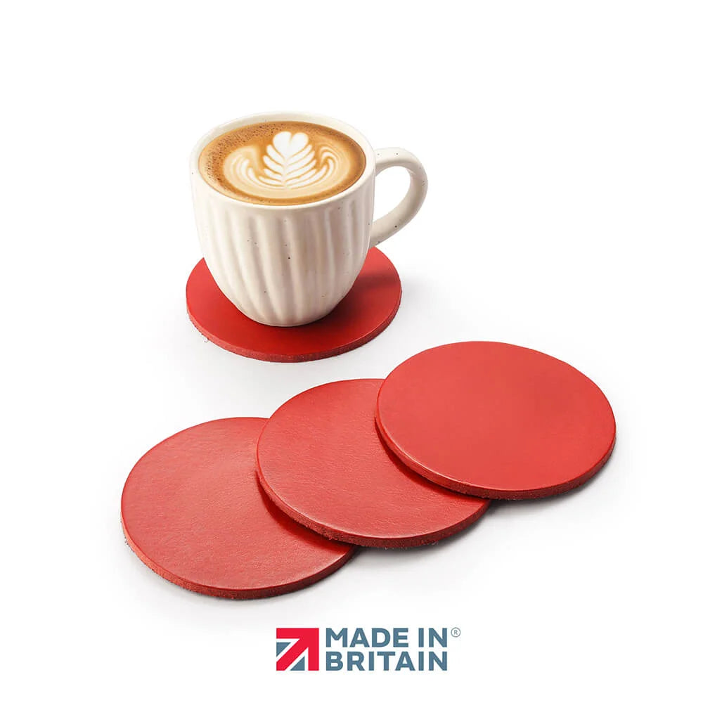 A set of 4 read leather coasters made in Britian