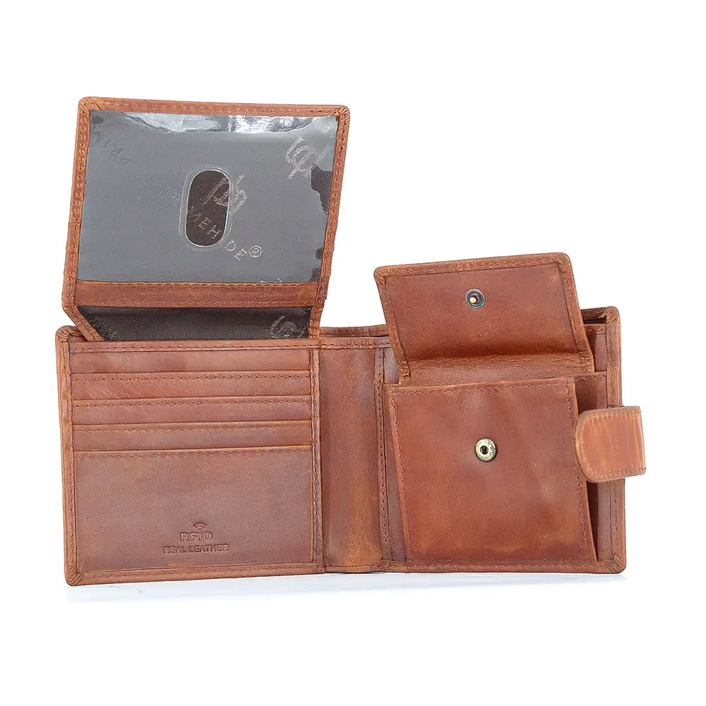 Open cognac leather wallet displaying a transparent ID window, multiple card slots and a press-stud coin pocket.