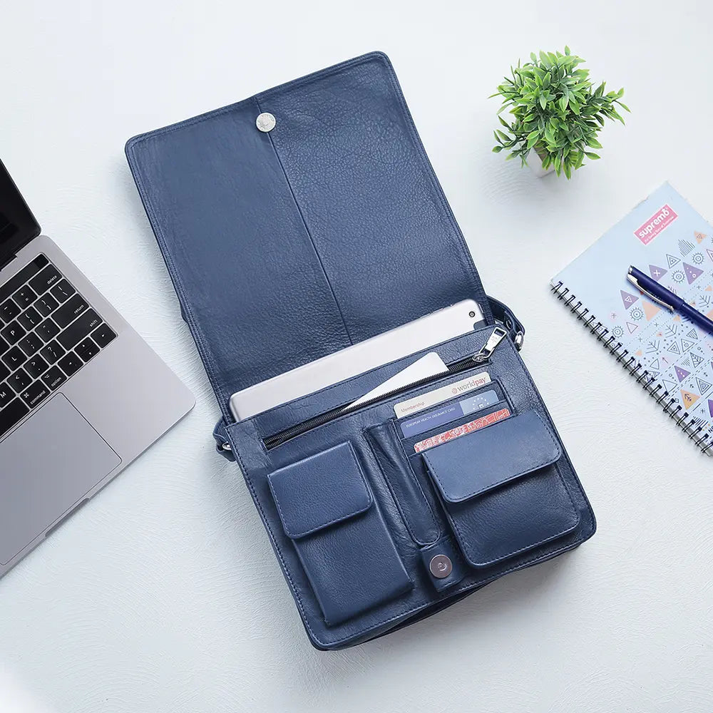 Open view of the navy Large Organiser Bag displaying its interior compartments, including credit card slots and pen holders.