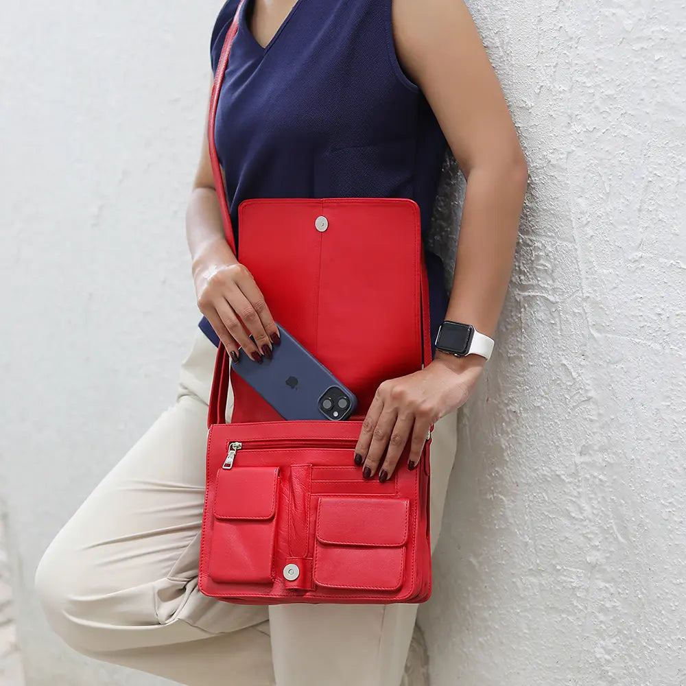 Close-up of the interior compartments of the Large red Organiser Bag, showcasing its multiple storage options.