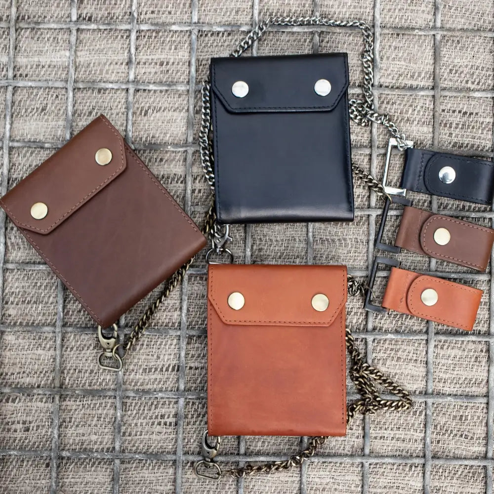 Black leather wallet with chain on a white background