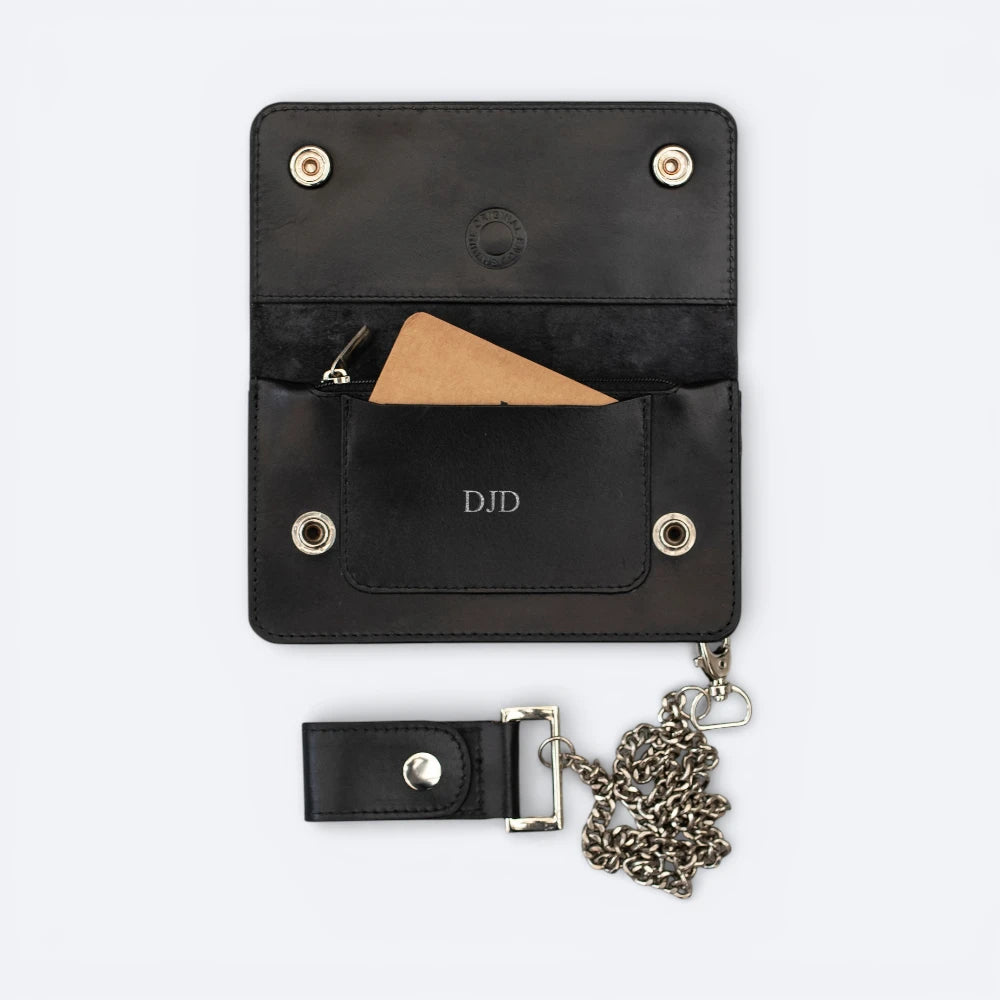 Black leather wallet with chain attachment on a white background