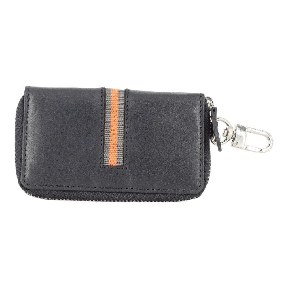 Black leather key case with a keychain on a white background