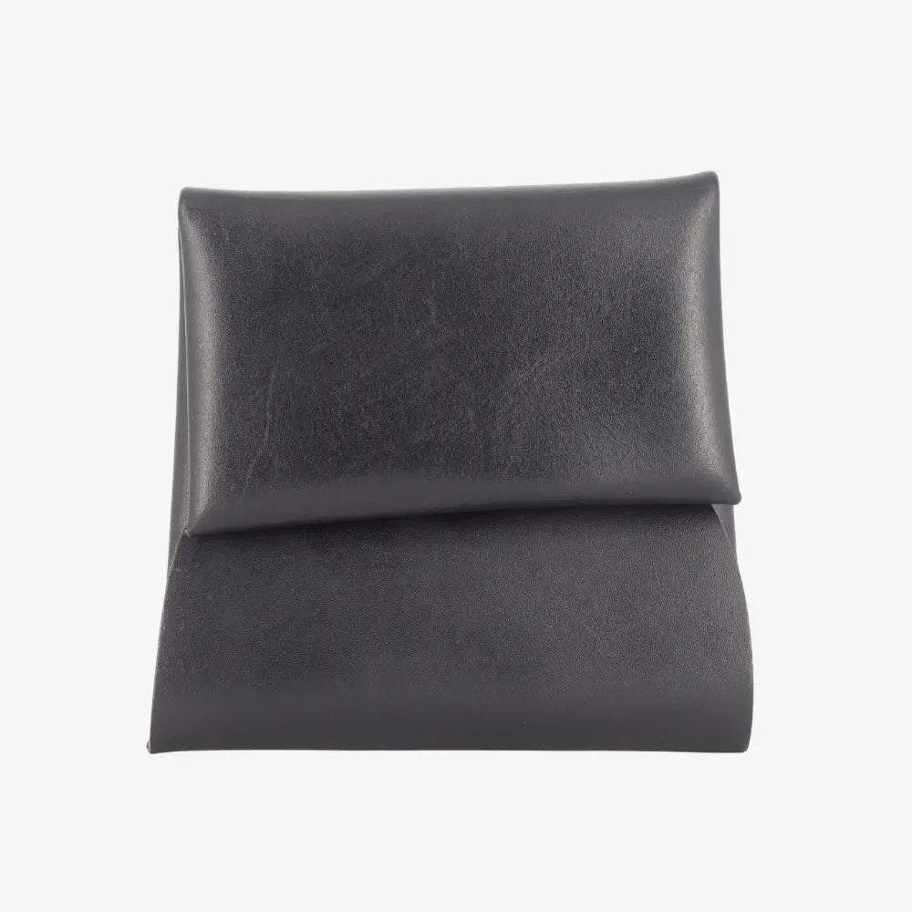 Front view of Black leather clutch bag on a white background