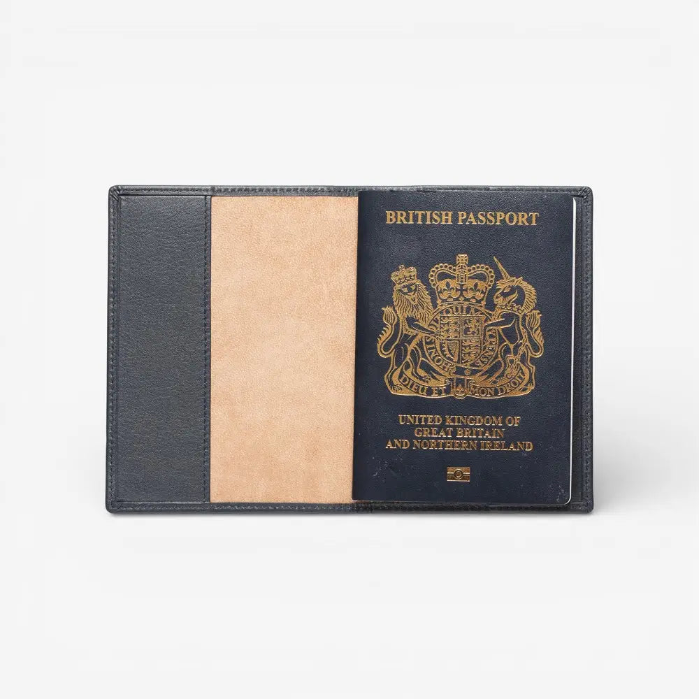 Passport holder with Black British passport design on a white background