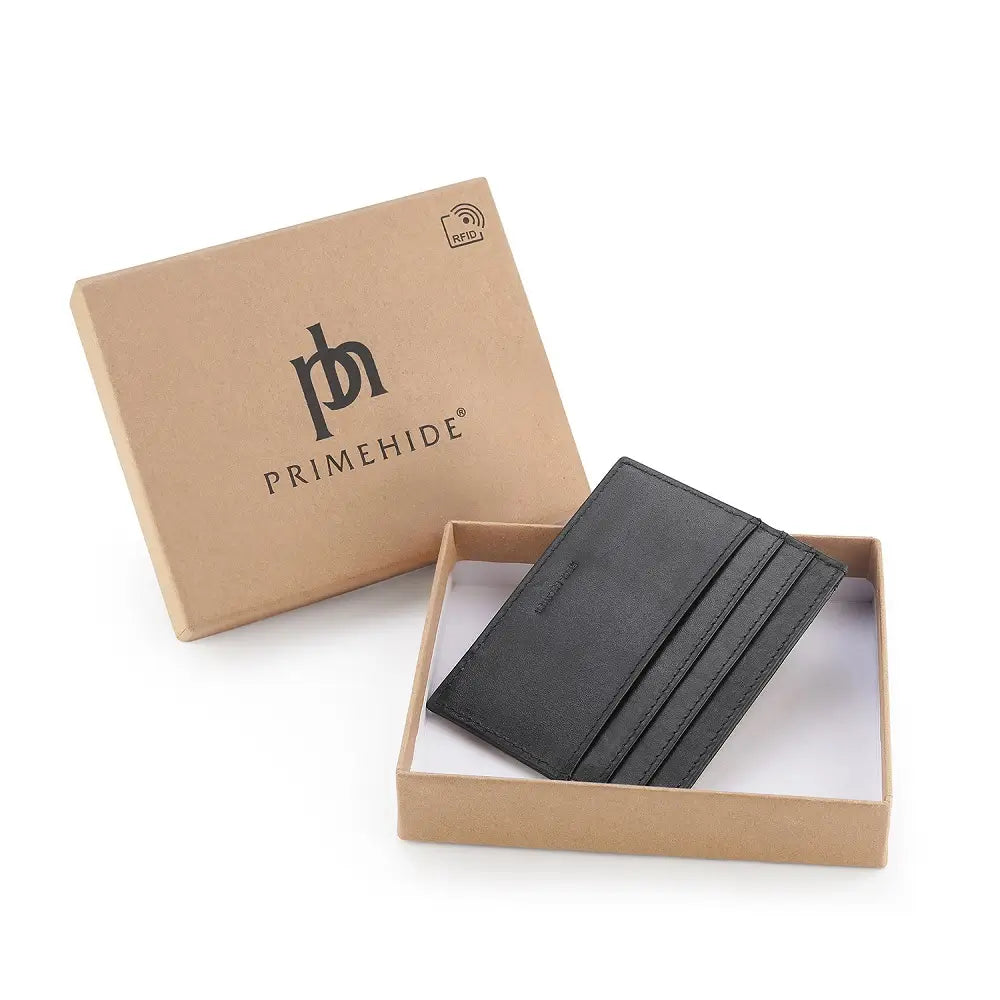 Black leather card holder in a Primehide branded box on a white background