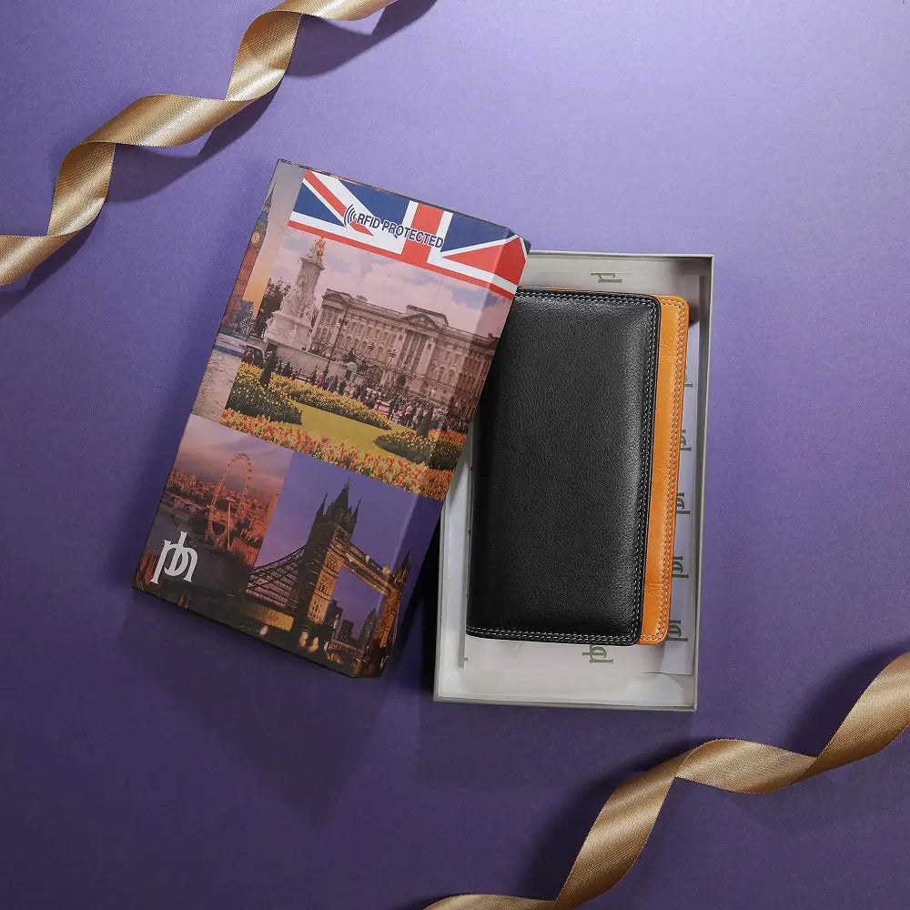 Lifestyle view of Black wallet with orange bottom section on a white background