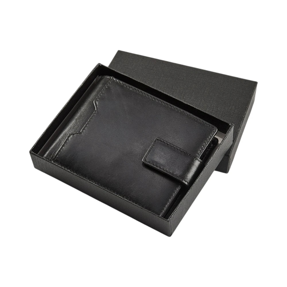 Black leather wallet in an open box on a white background