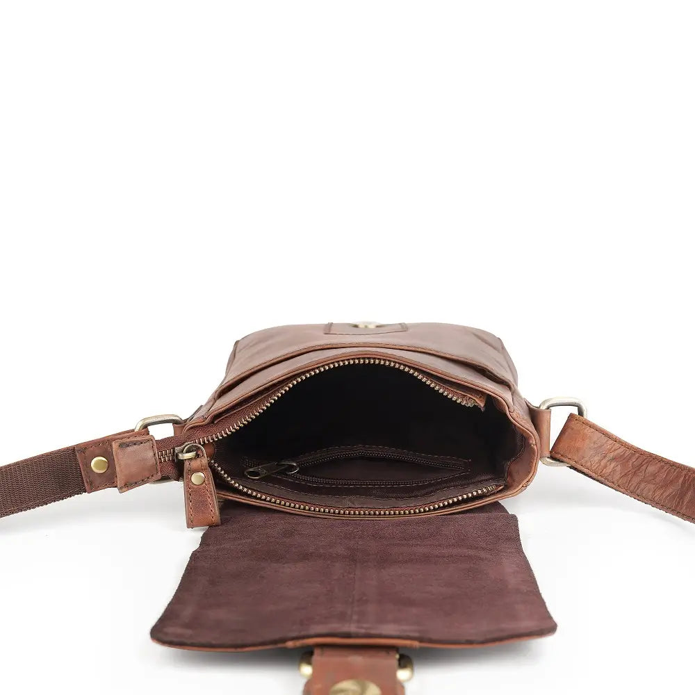 Brown leather crossbody bag on a white background