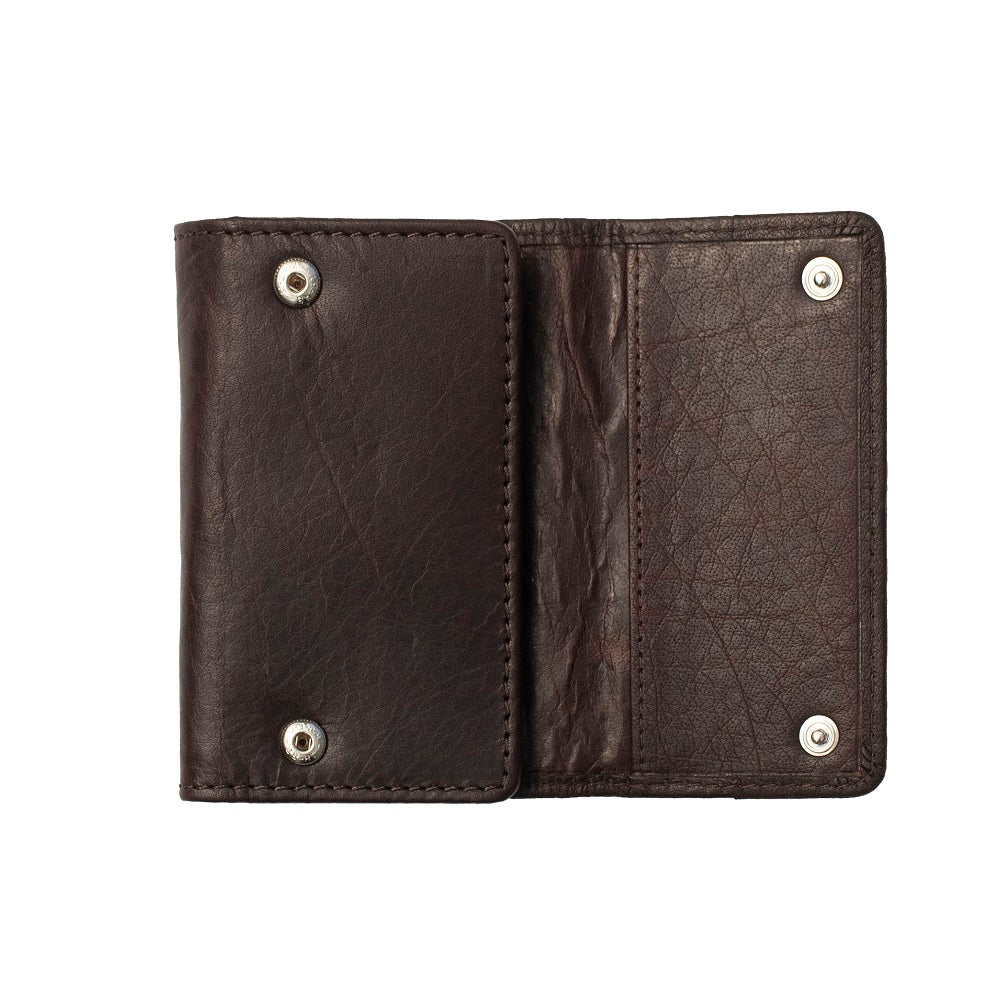 Open view of Brown leather key chain with metal rivets on a white background