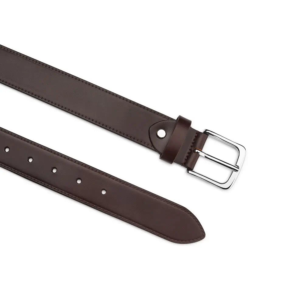 Top angle of Brown leather belt with a silver buckle on a white background