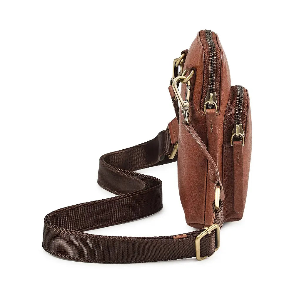 Brown leather phone bag with gold zippers on a white background