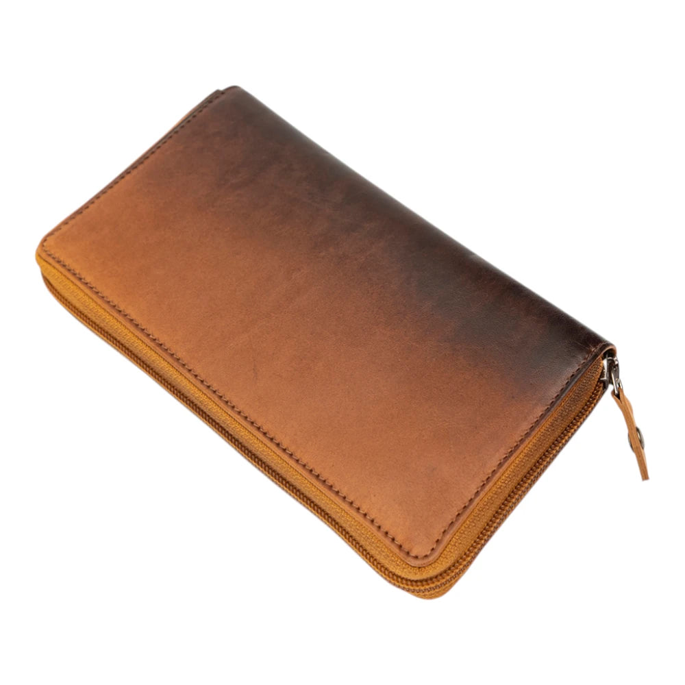 top view of Brown Leather Zip Around Purse on a white background