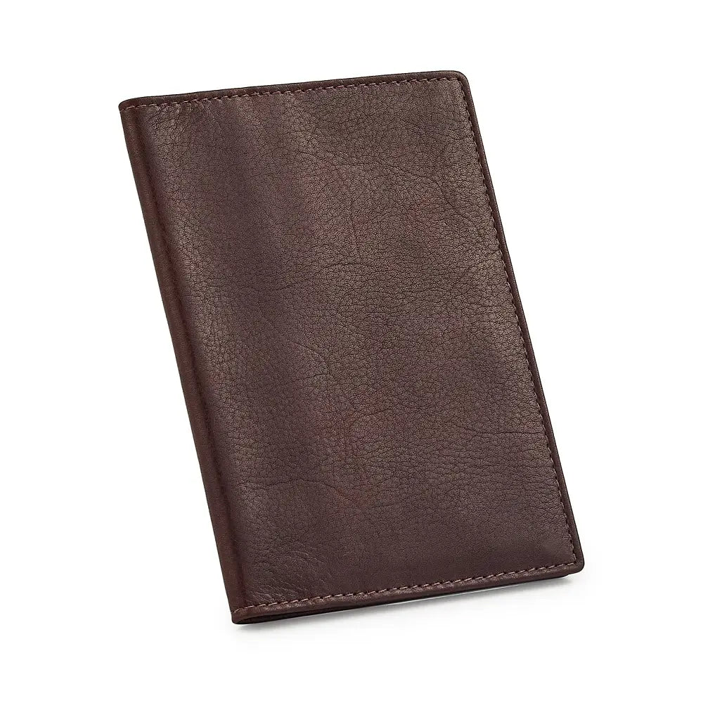 Brown leather passport holder on a white background
