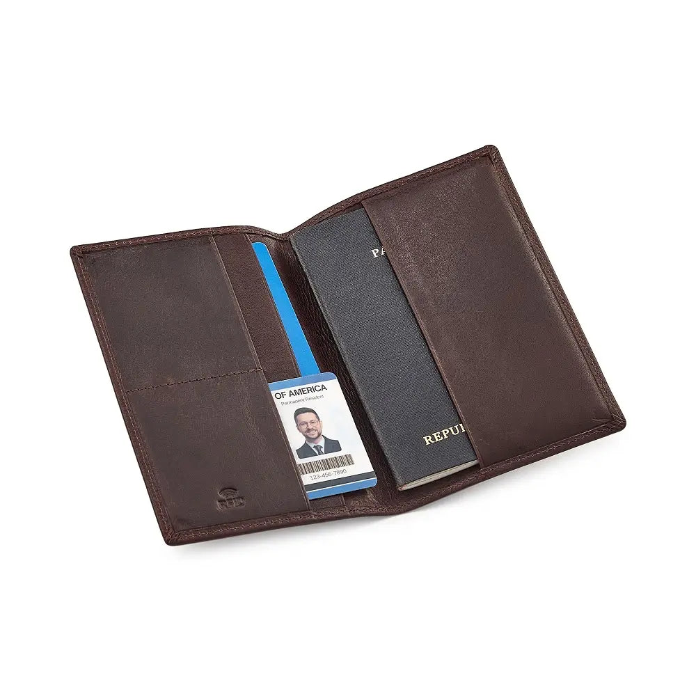 Brown leather passport holder with a passport and ID card on a white background