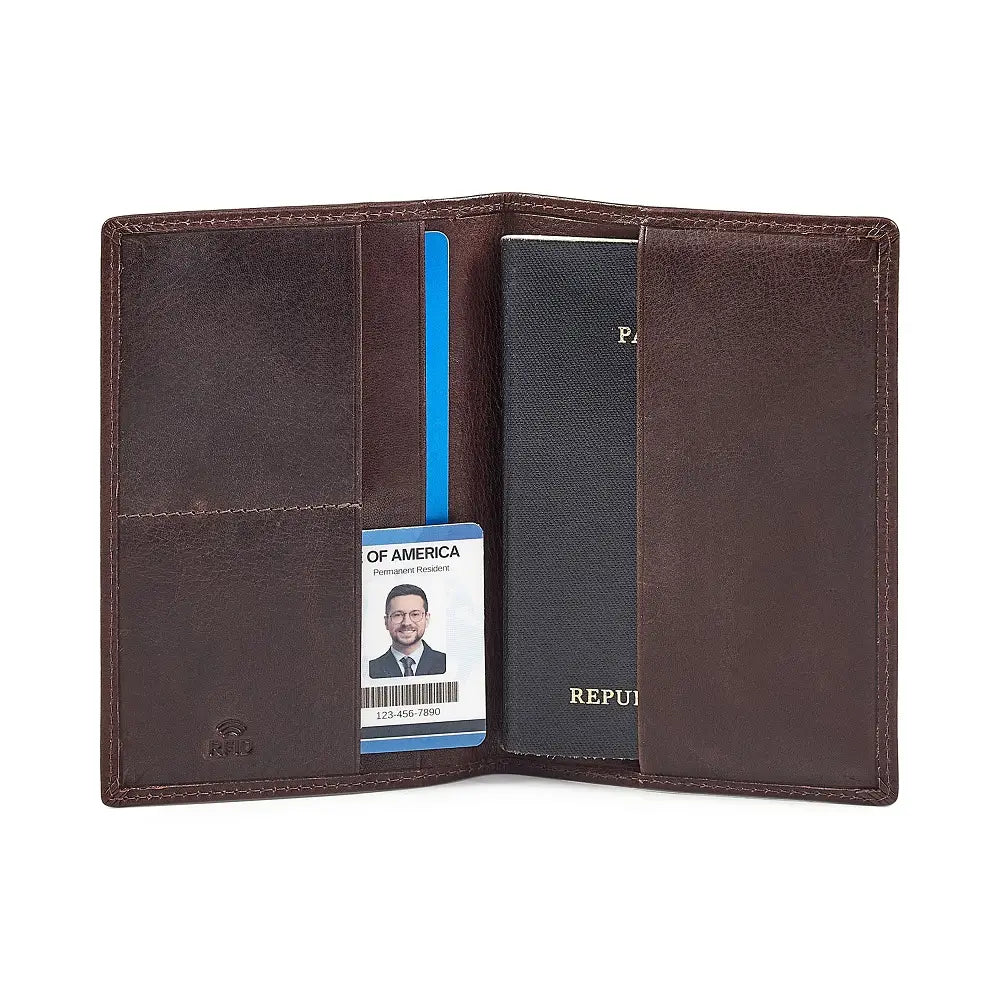 Brown leather passport holder with a passport and card holder on a white background