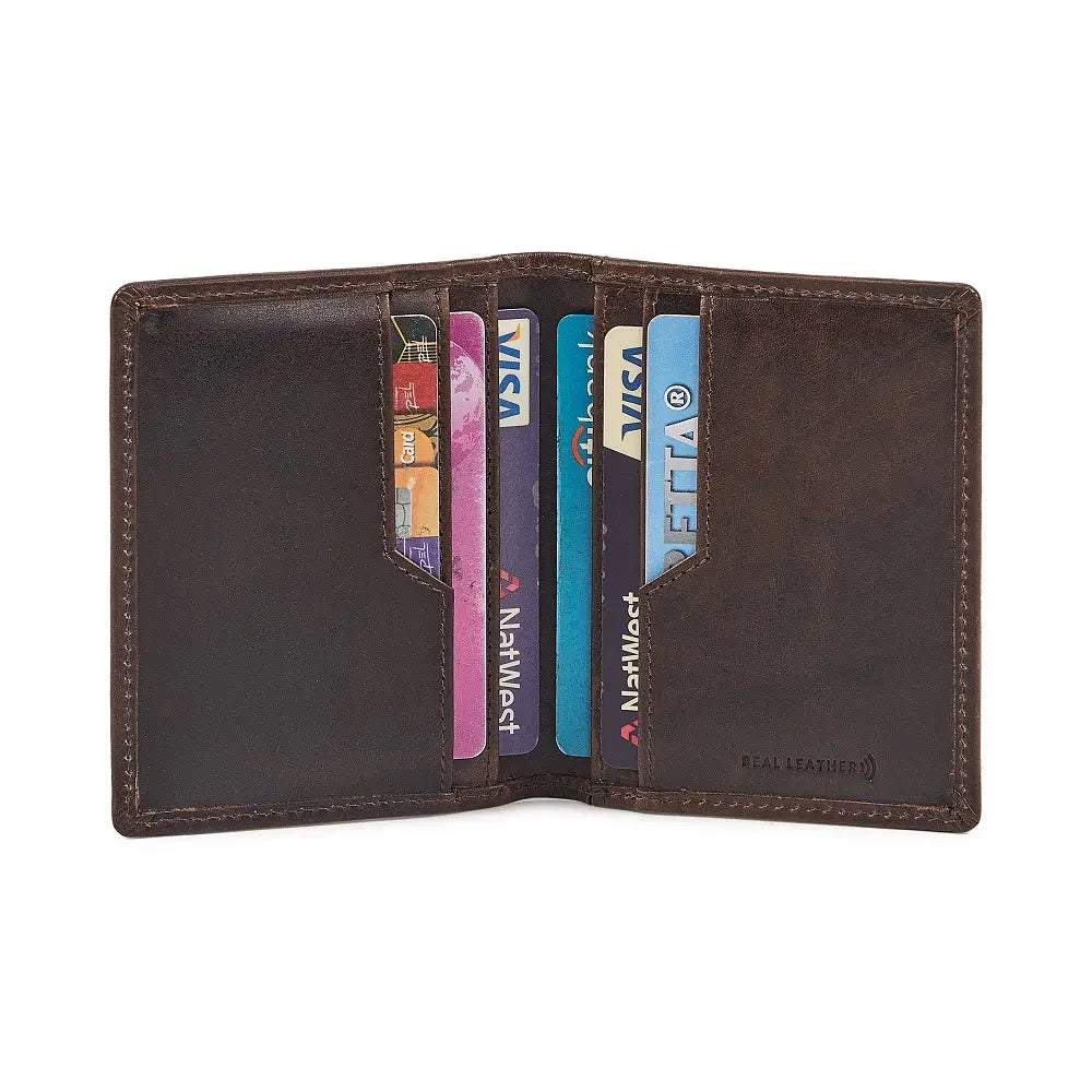 Brown leather credit card holder with credit cards inside on a white background
