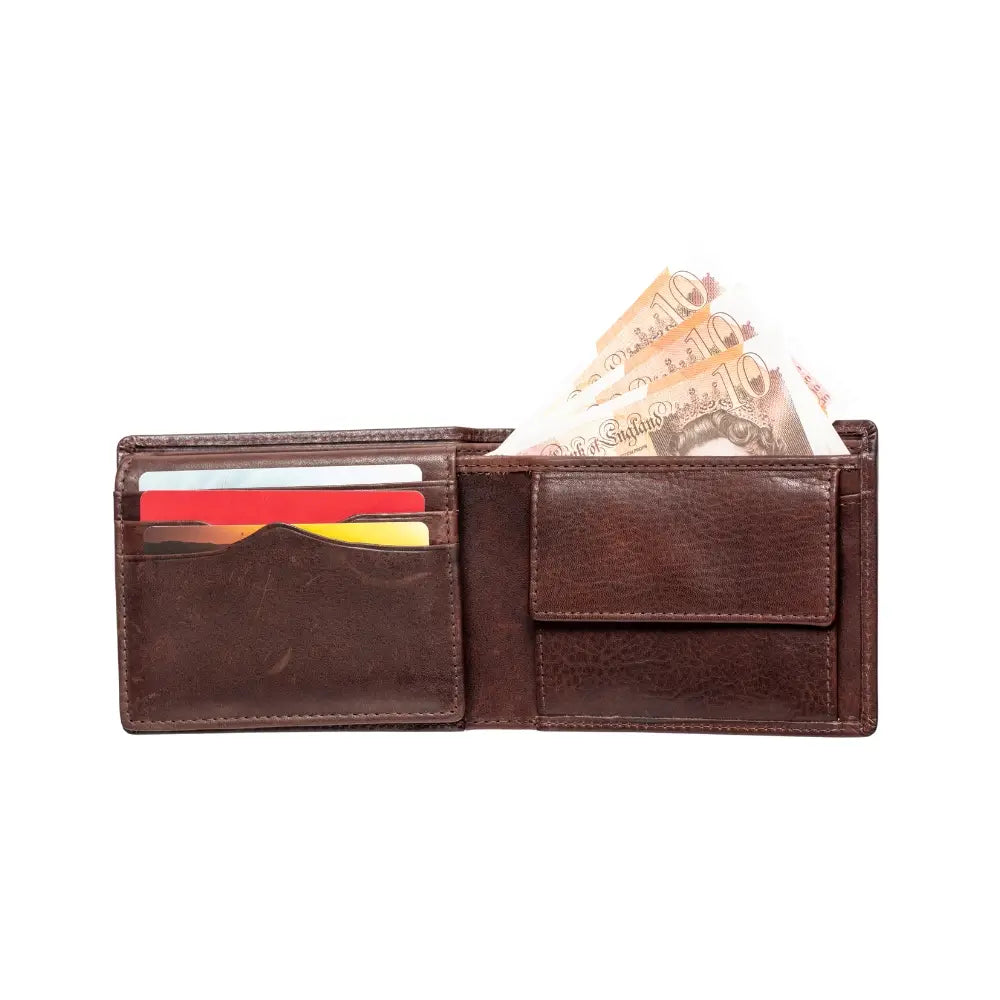 Brown leather wallet with money and cards on a white background