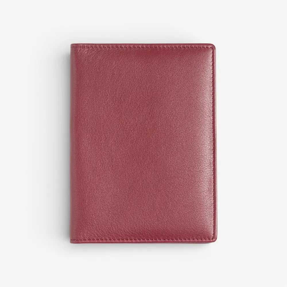 Burgundy leather wallet on a white background