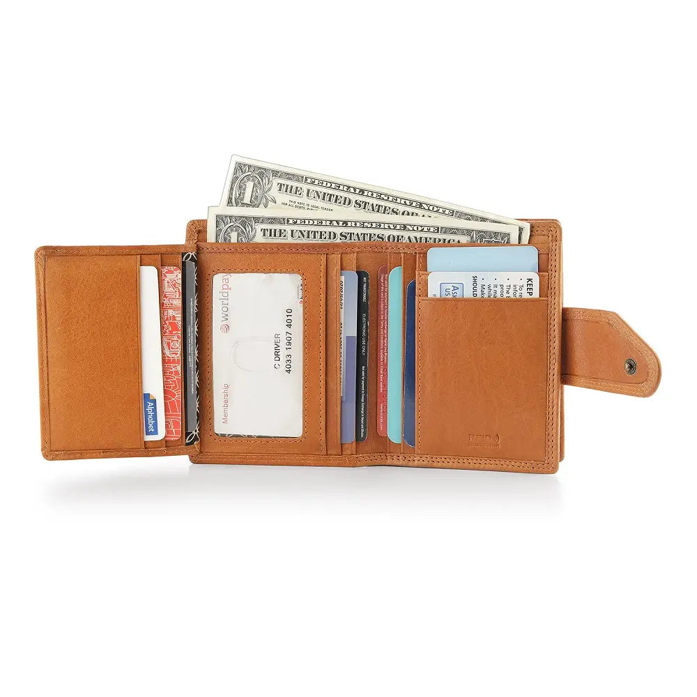 Inside view of cognac leather wallet with money and cards on a white background