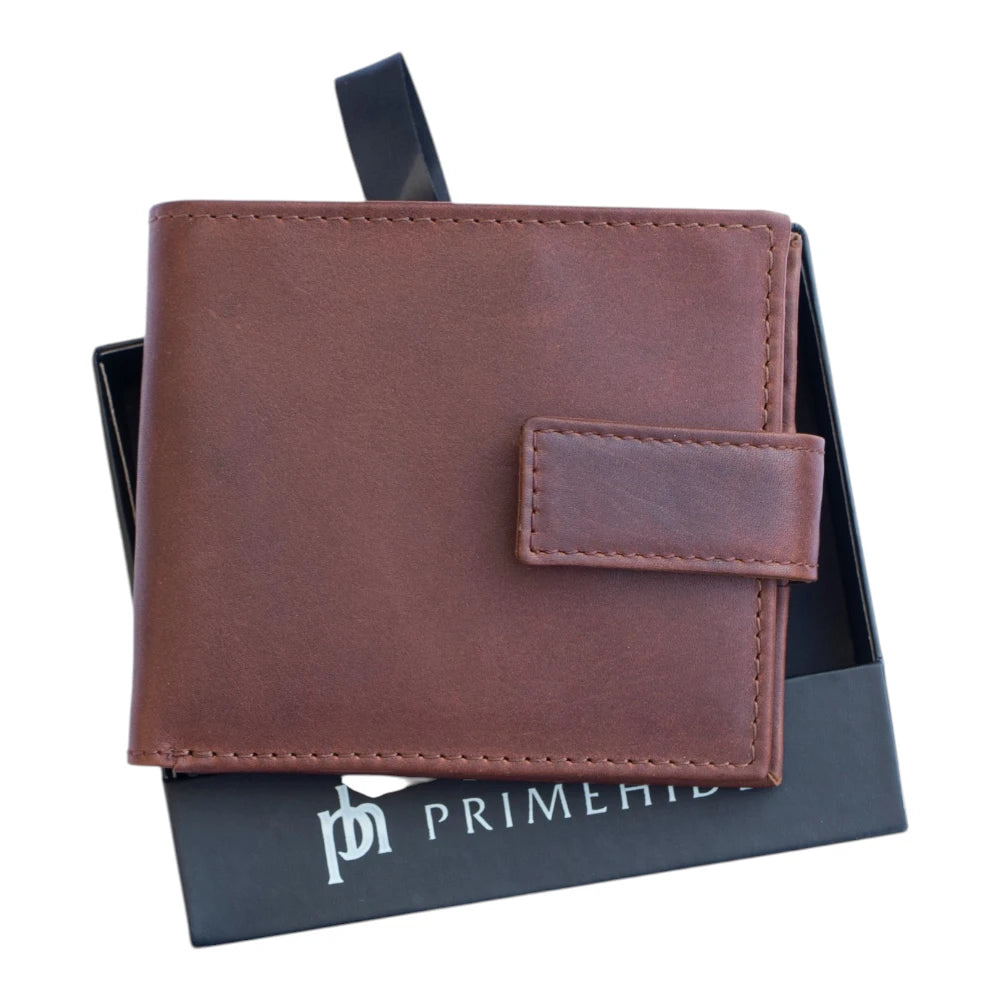 Cognac  leather wallet on a black box with 'Primehide' branding
