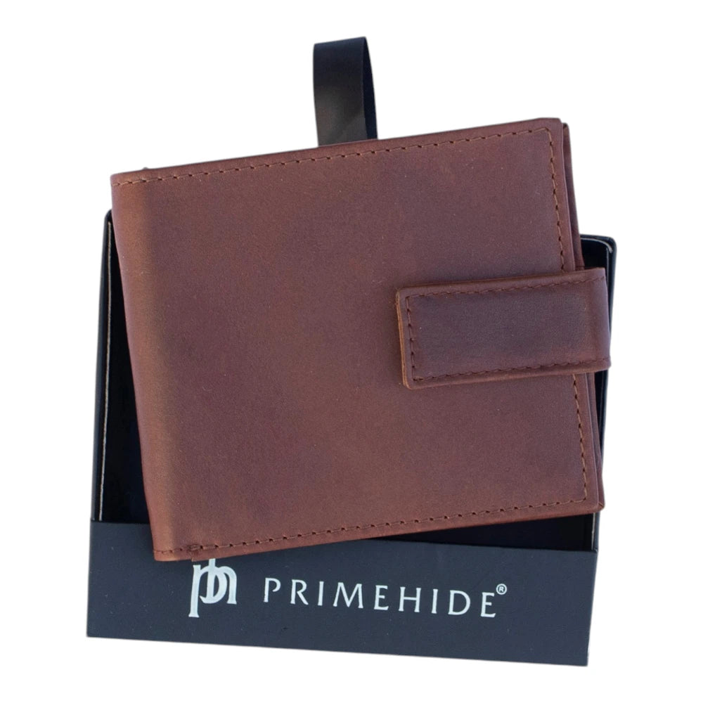 Cognac leather wallet on a Primehide branded stand against a white background