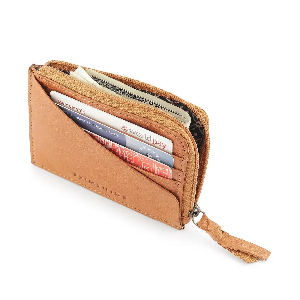 Cognac leather wallet with cards on a white background