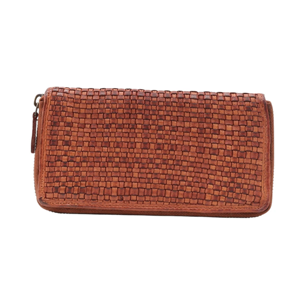 Cognac leather purse on a white background
