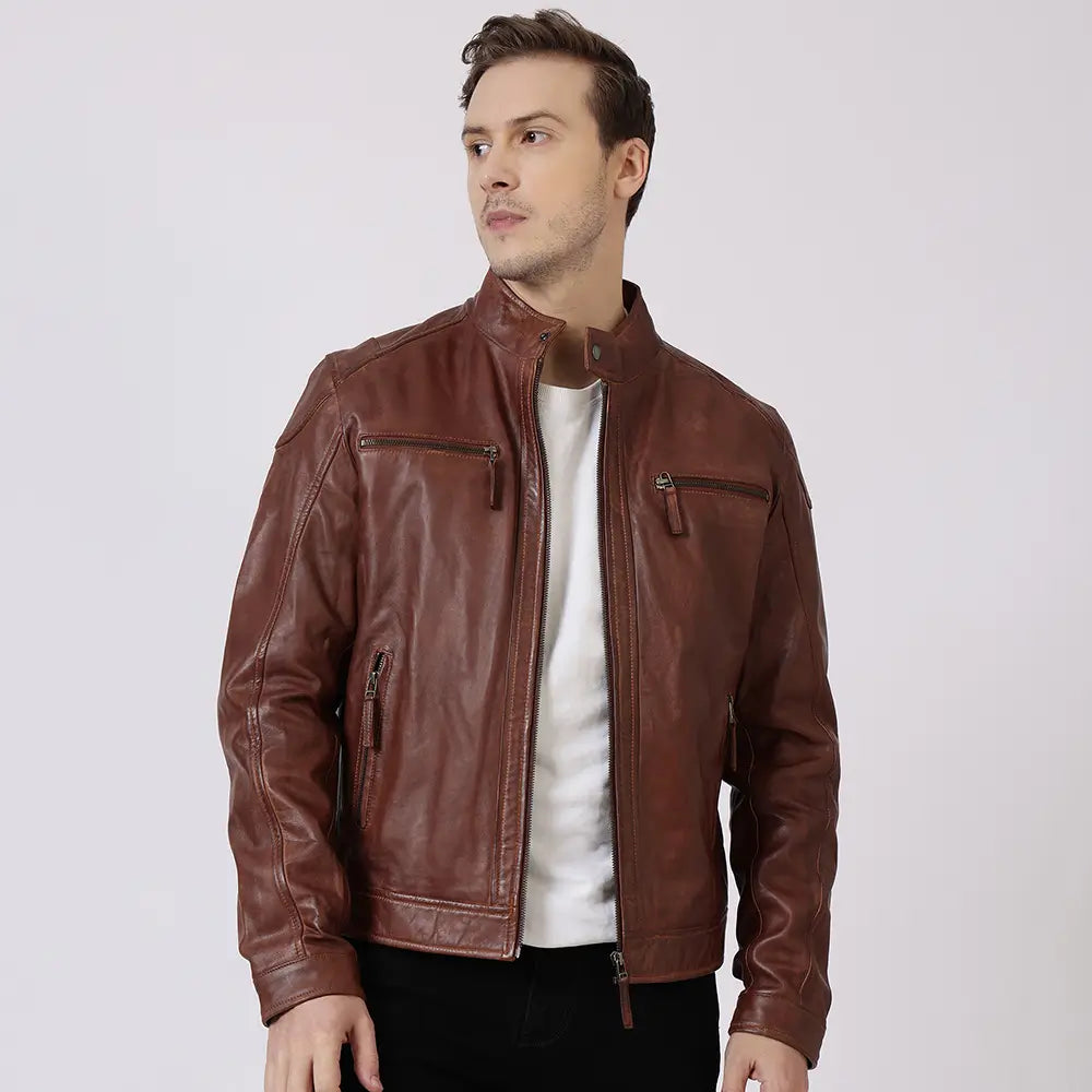 Man wearing a cognac leather jacket on a white background