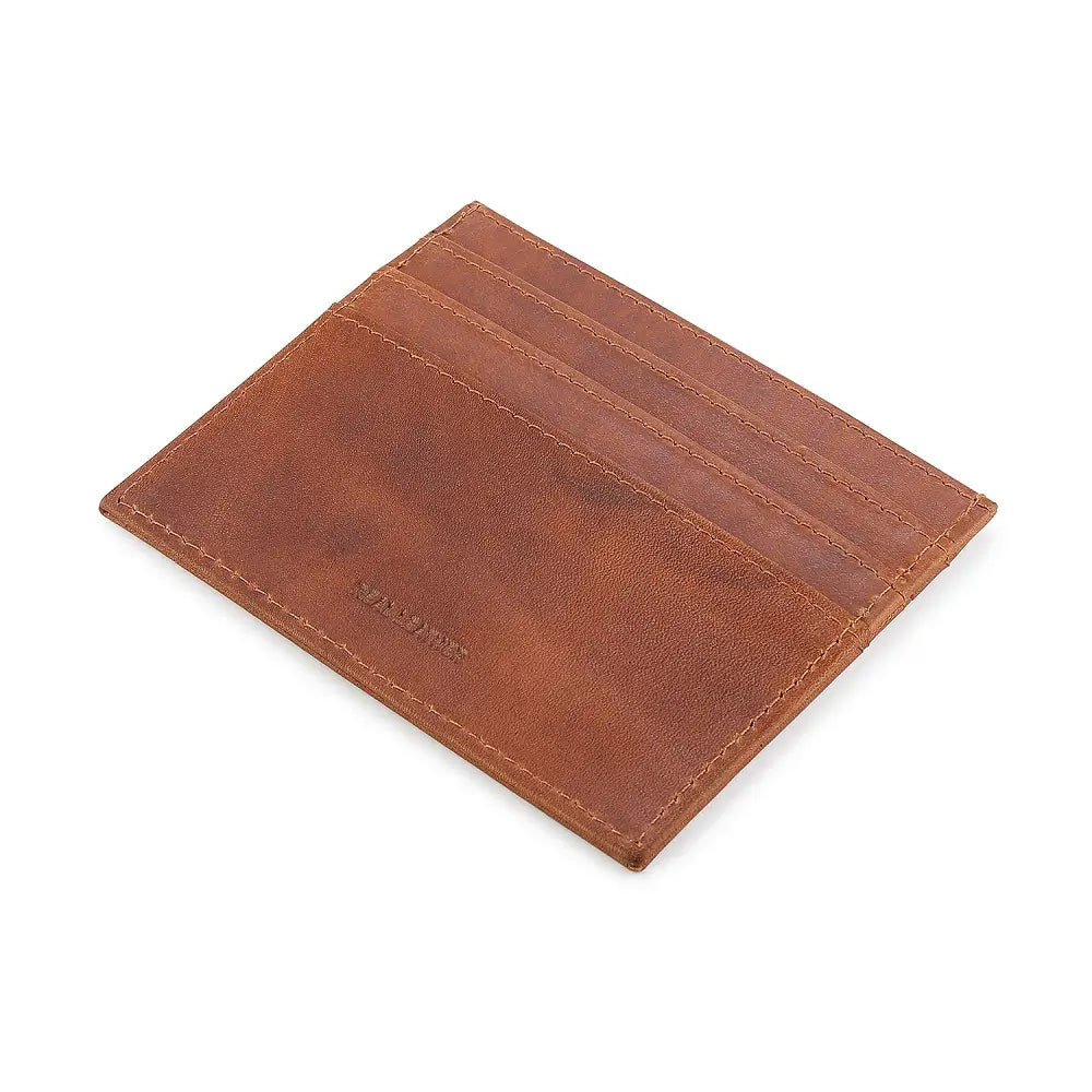 Cognac leather card holder on a white background