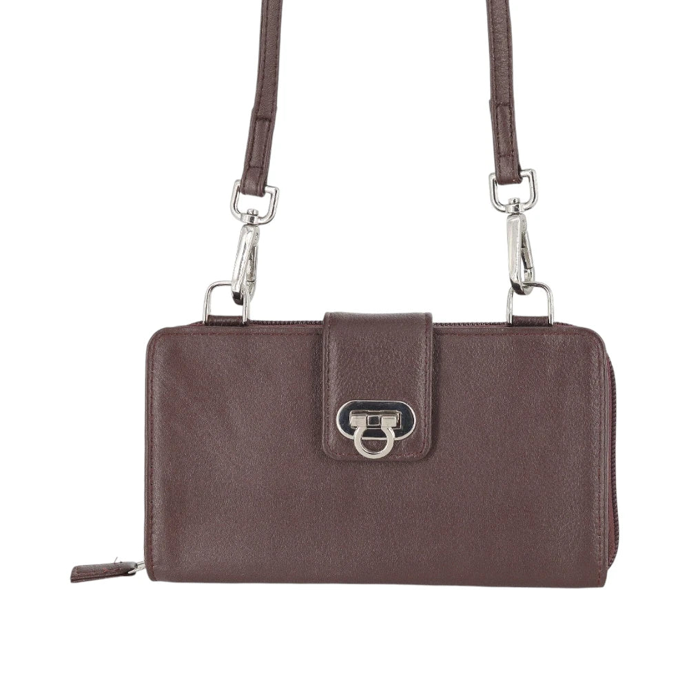 Brown leather purse with a strap on a white background