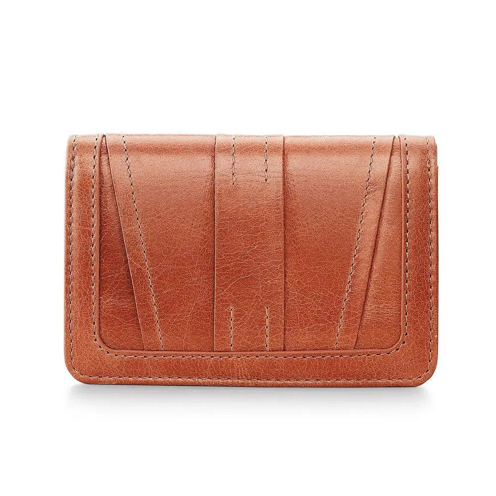 cognac leather purse on a white background
