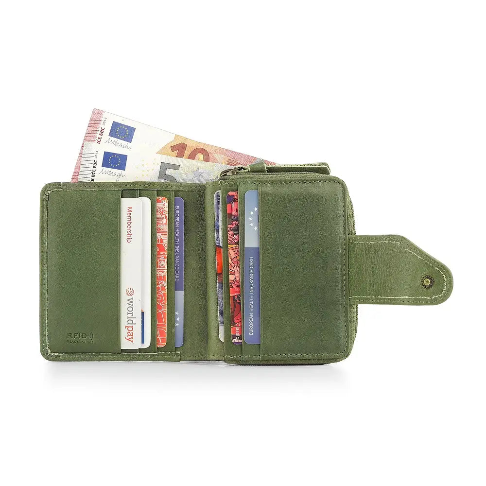 Green wallet with cards and money on a white background