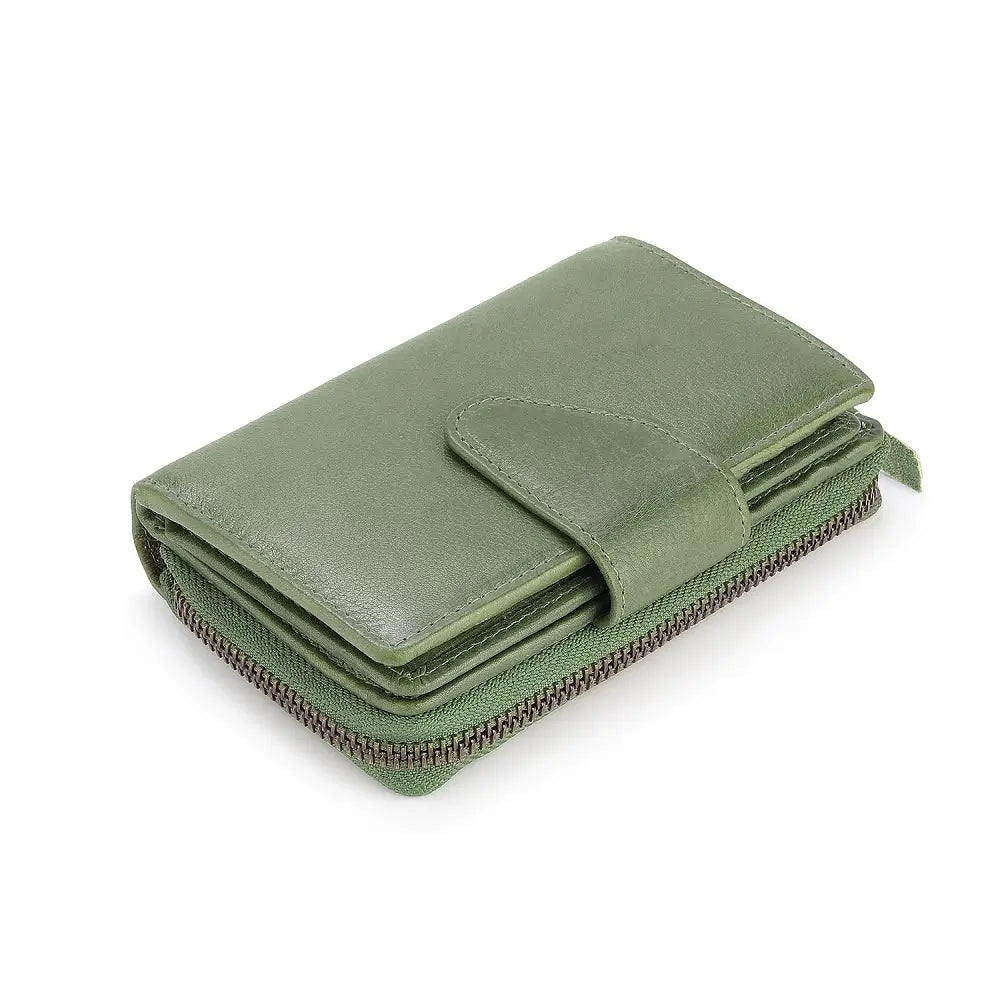 Top view of Green leather wallet with a zipper on a white background