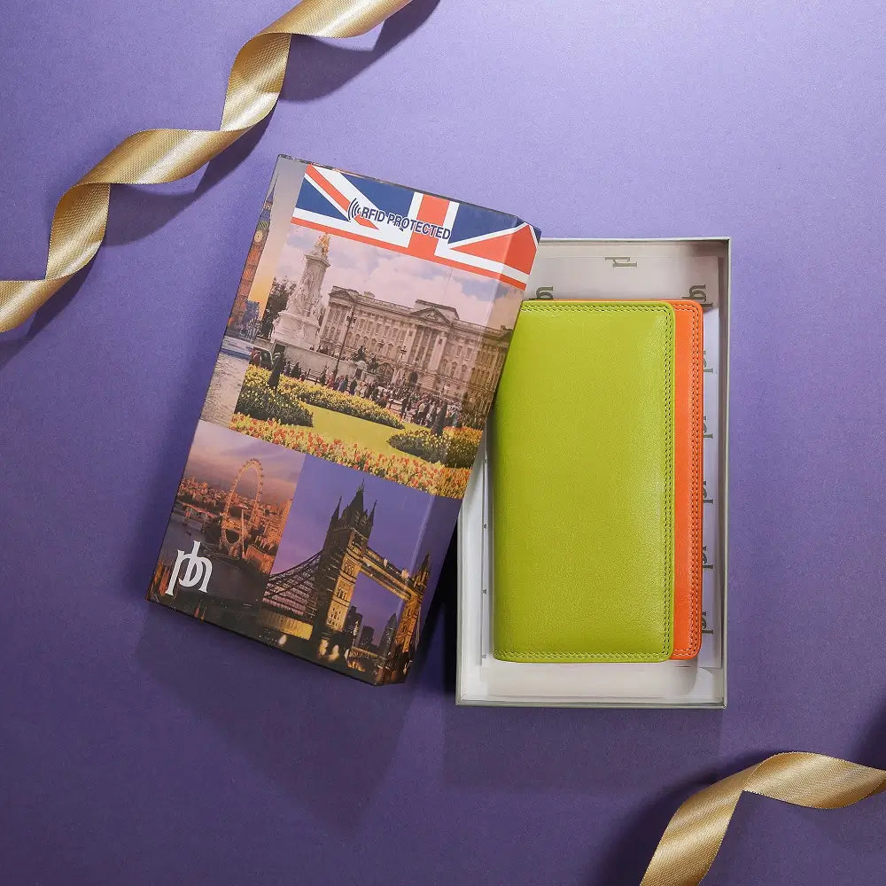 Lifestyle view of Green wallet with orange bottom section on a white background