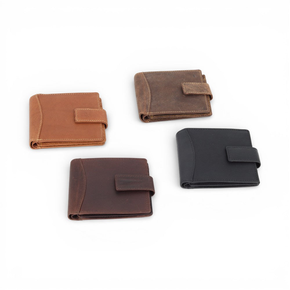 Four leather wallets in different colors on a white background