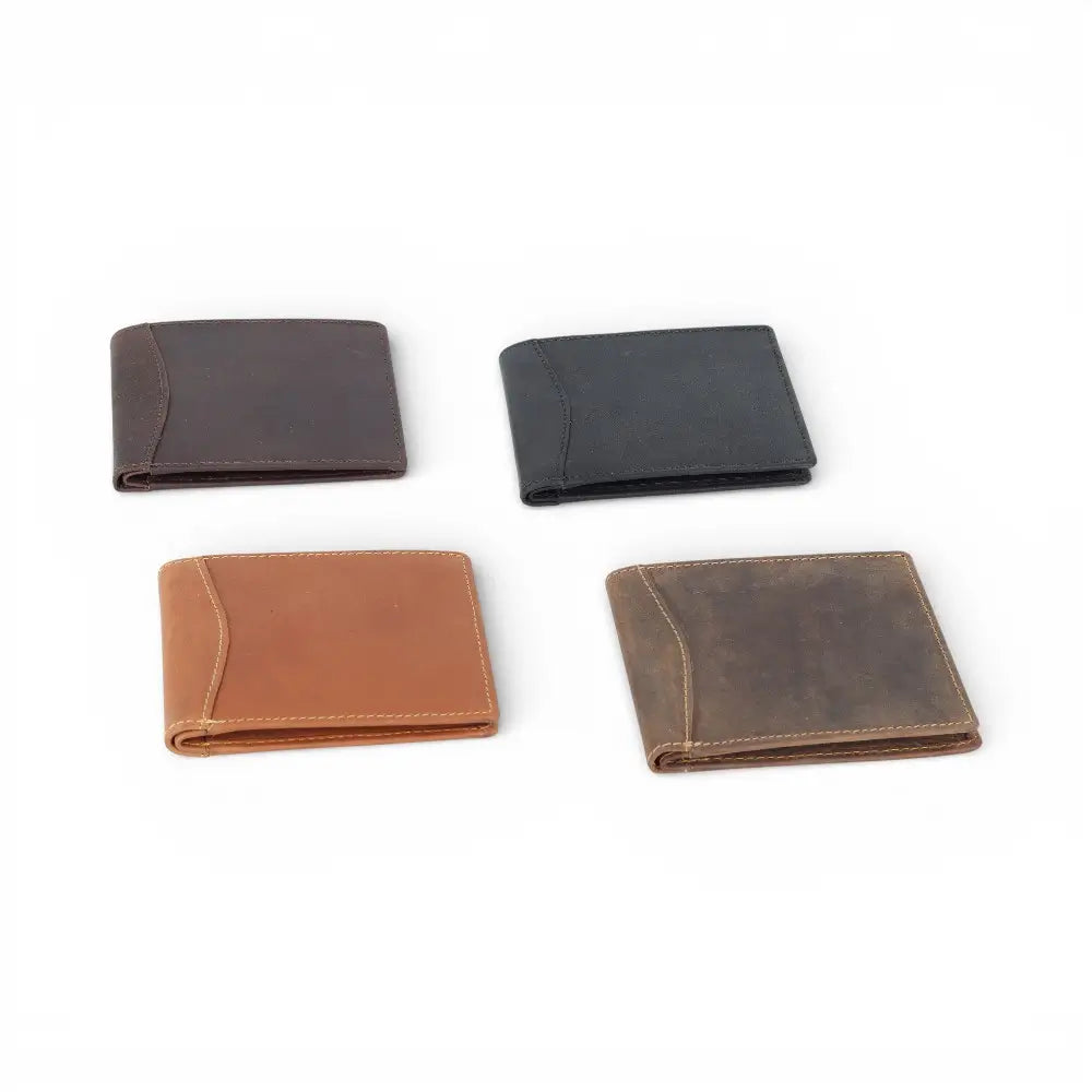 Four leather wallets in different colors on a white background