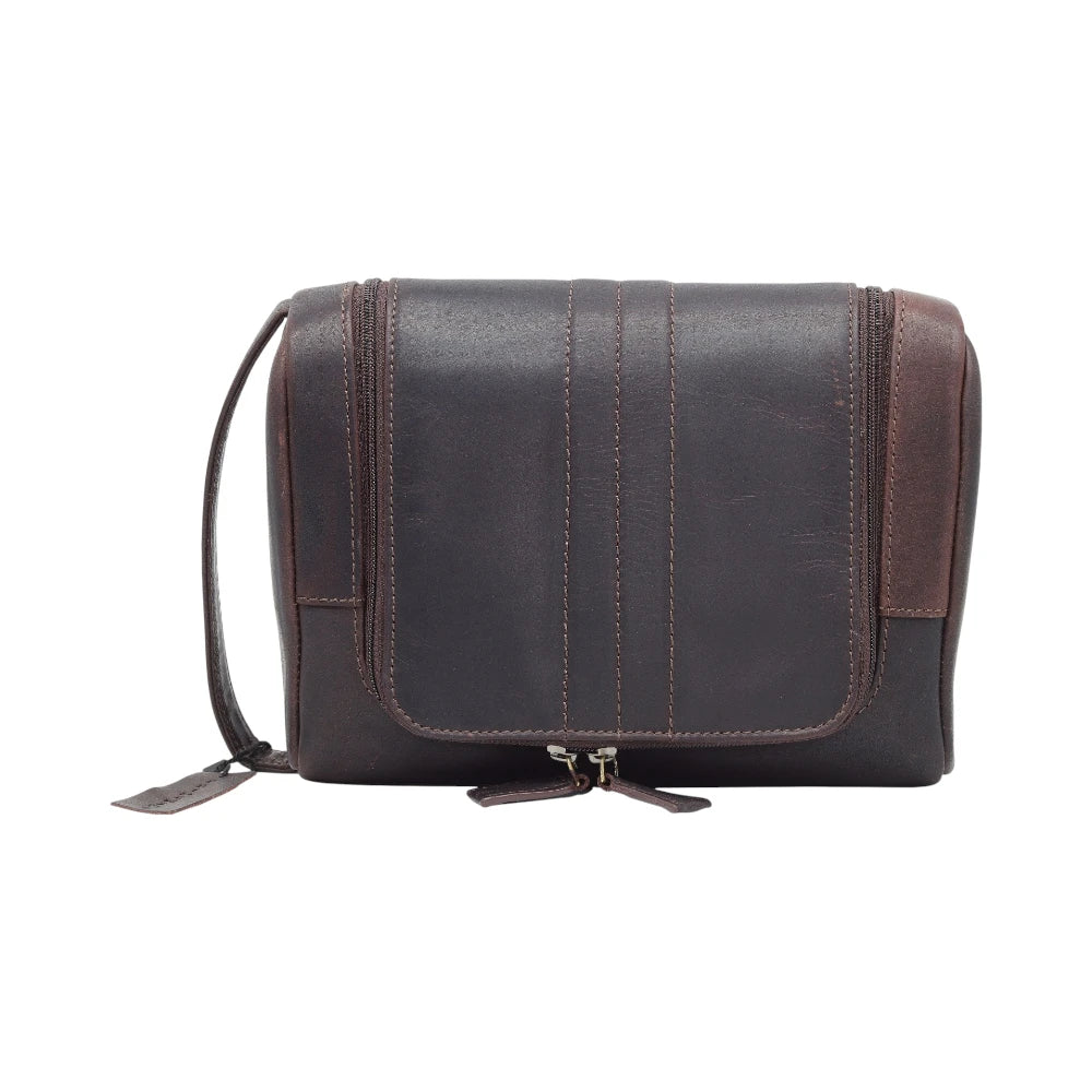 Brown leather bag with visible stitching on a white background