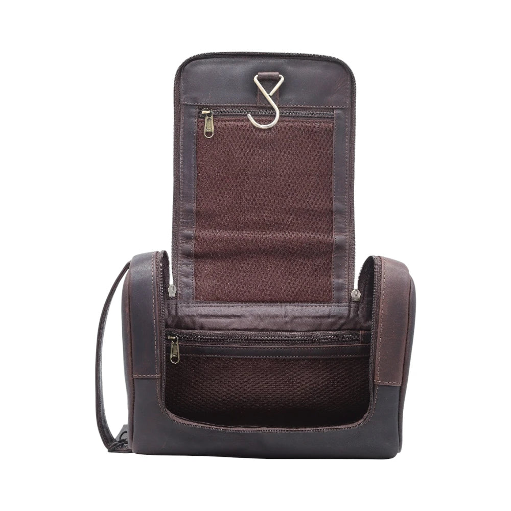 Brown leather travel bag with mesh pocket on a white background