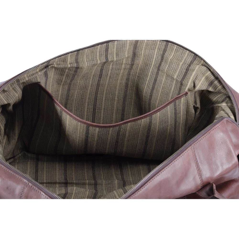 Open bag revealing a striped interior with a leather trim