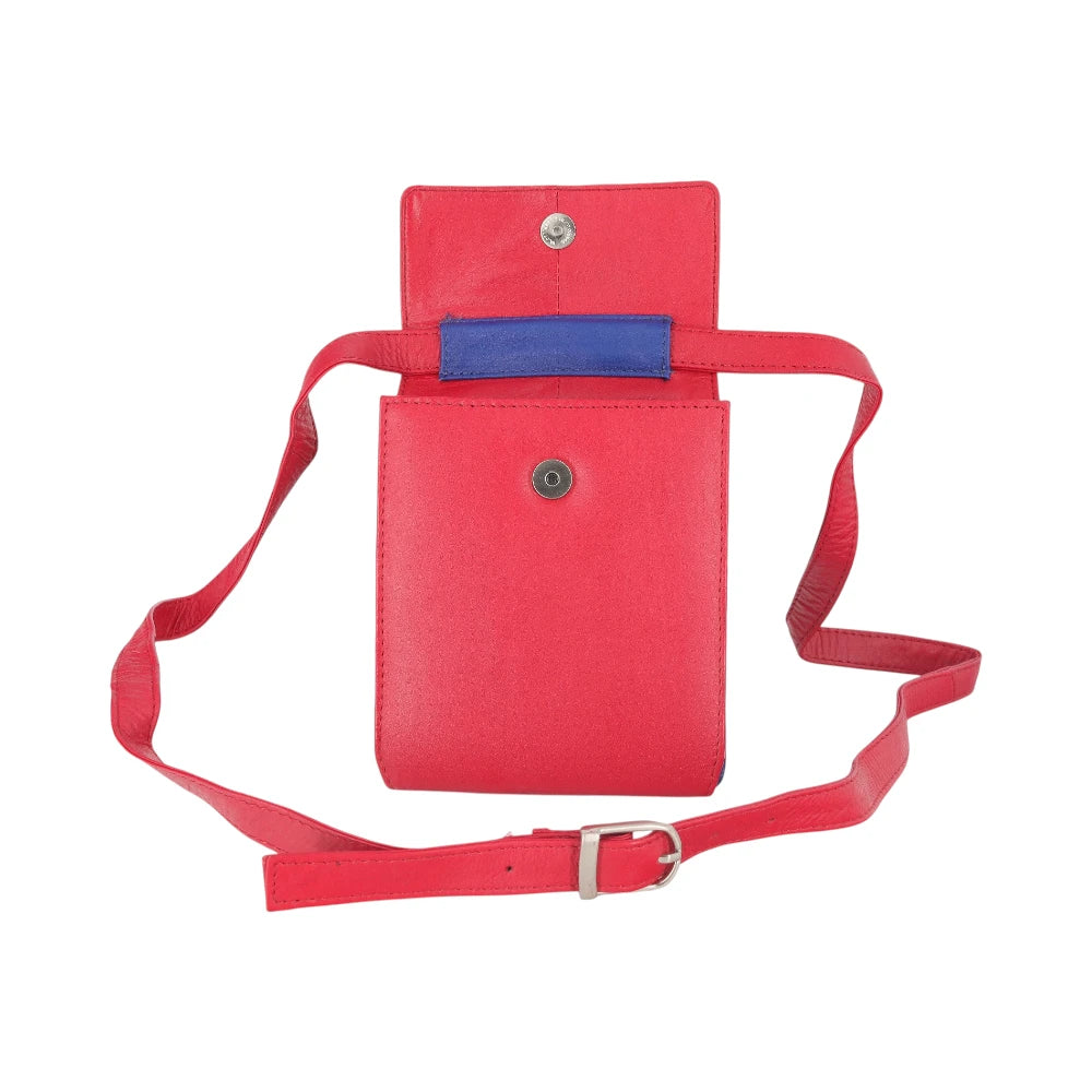 Open view of Red crossbody bag with a blue strap on a white background