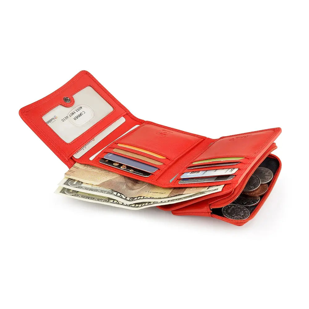 Orange  wallet open to show money, cards, and coins on a white background