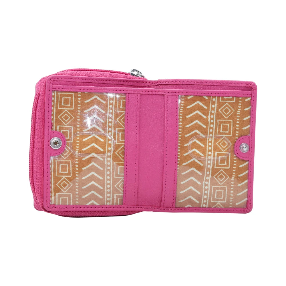 Pink purse with tribal pattern on a white background