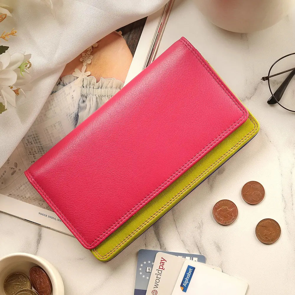Lifestyle view of  Pink wallet with green bottom section on a white background