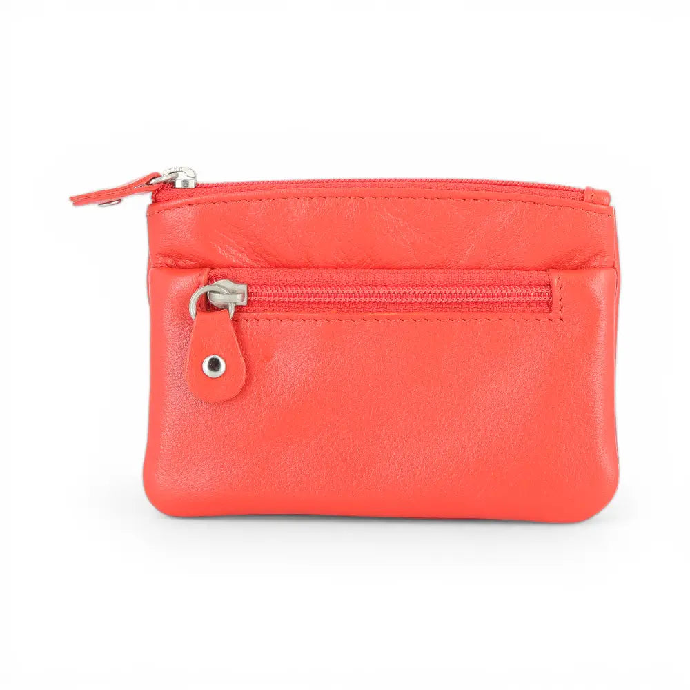 Pumpkin leather pouch with a zipper on a white background